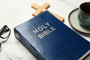 Holy Bible on white marble background