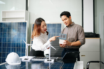 Engineer Team Meeting of Sustainable on a solar and wind energy project, discussing innovation and...
