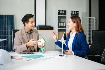 Team of industrial engineers meeting of renewable energy working on an  solar panel battery business model,ESG strategy