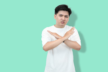 Studio Shot: Man Rejecting with Crossed Arms 