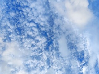 sunny day with blue sky with white clouds