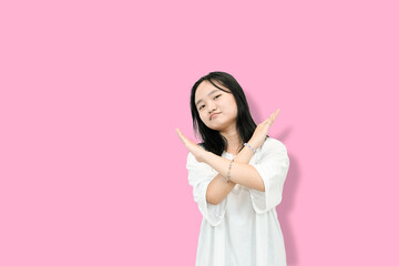young asian woman gesturing no or rejection
