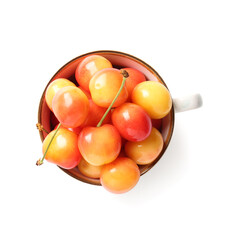 Cup with sweet yellow cherries on white background
