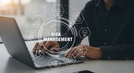 Risk management concept with digital icons and person working on laptop