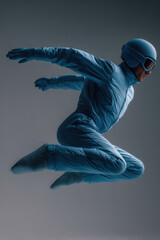 dynamic ski jumper captured midair positioned on left side of frame