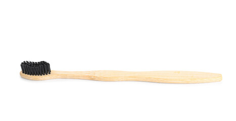Wooden toothbrush on white background