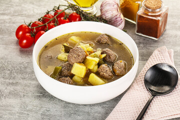 Soup with meatball and potato