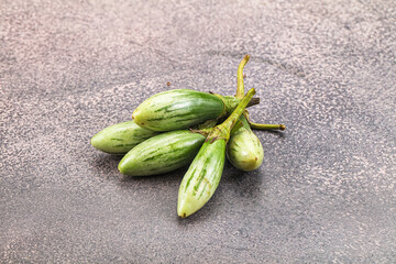 Small organic young green eggplant