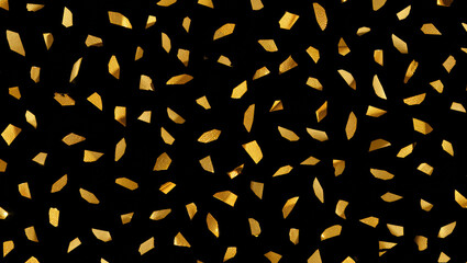 Fragmentos de l&aacute;mina dorada sobre fondo negro. 