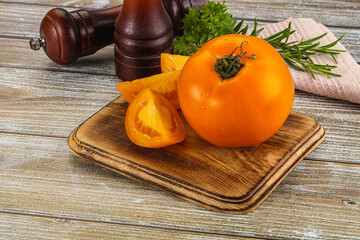 Organic juicy ripe yellow tomatoes