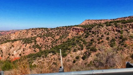 Texas Panhandle is characterized by dramatic canyon landforms, primarily due to the erosive power of rivers and wind over millions of years.