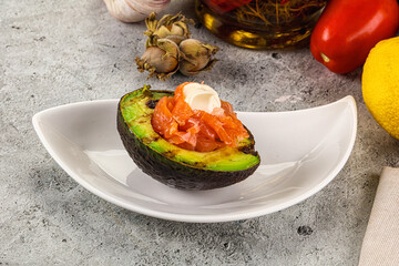 Whole grilled avocado with salmon