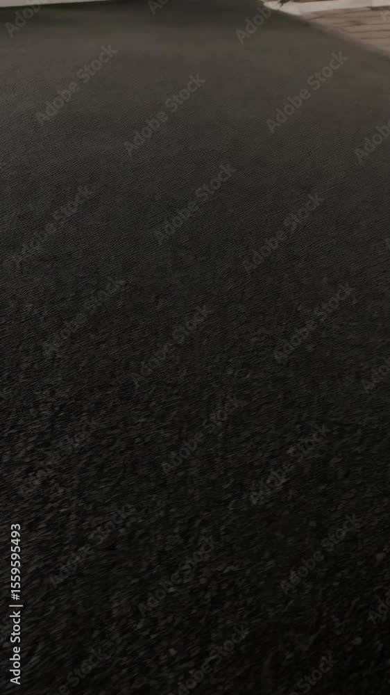 Poster extreme close up of textured black fabric material in natural lighting creating an abstract and simp