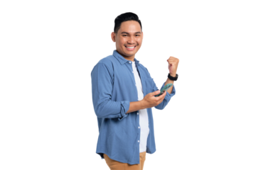Yes, Great news. Excited young Asian man in casual shirt using smartphone, making winning gesture, celebrating success isolated on transparent background