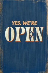 Wooden open sign showing retro serif text on weathered blue board in vintage flat design