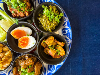 Top view of a set of traditional Thai Northern food.
