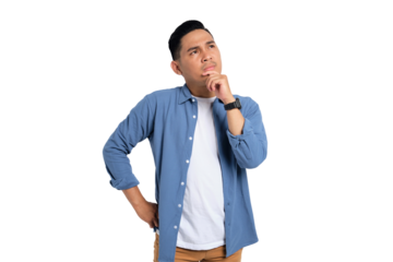 Pensive young Asian man in casual shirt touching his chin, looking up at copy space, having doubts about something isolated on transparent background