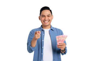 Successful financial planning. Smiling young Asian man in casual shirt holding money and pointing finger at camera isolated on transparent background