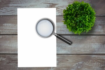 Magnifying glass on paper