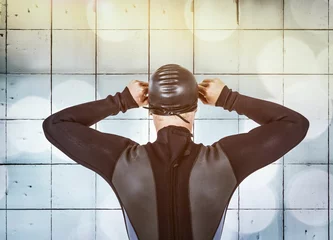 Photo sur Plexiglas Rear view of swimmer against wall