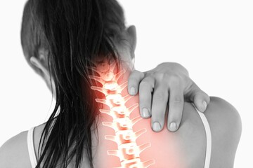 Highlighted spine of woman with back pain