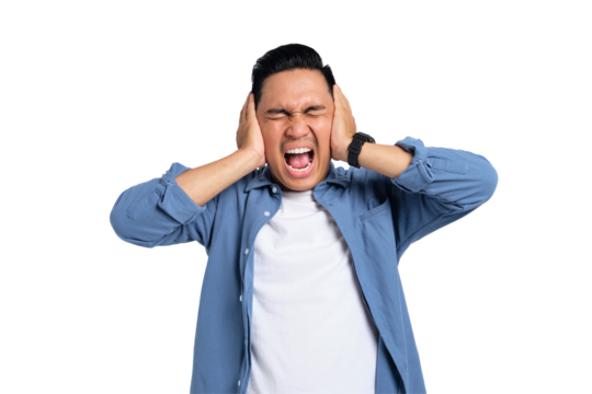 Irritated young Asian man in casual shirt covering his ears with hands, disturbed by loud noise isolated on transparent background