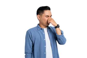 Young Asian man in casual shirt holding breath with finger on nose, smelling something stinky and disgusting isolated on transparent background