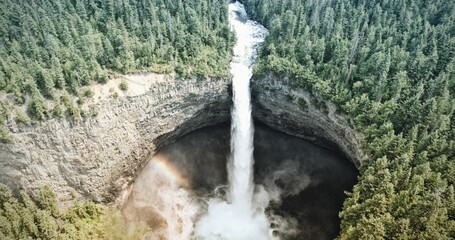 Fototapeta premium Waterfall and forest around a circle