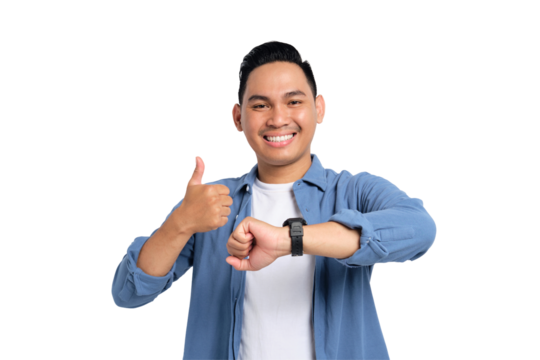 Smiling young Asian man in casual shirt wearing watch and showing thumbs up isolated on transparent background