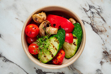 Grilled zucchini, tomatoes, and mushrooms create a vibrant, healthy summer dish