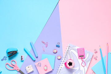 Different stationery on color background