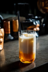 A stunning iced drink with distinct layers of milk and tea is a visual treat