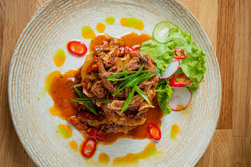 Savor the colors and textures of this delectable beef dish, enhanced by fresh herbs and spices