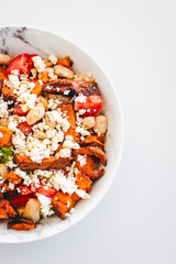 white bean and sweet potato salad with tomato avocado and feta