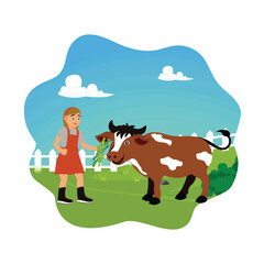 Young farmer feeding cattle on a beautiful sunny countryside farm.