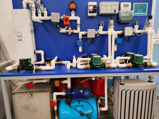 The control panel of the water supply system, with switches and indicators.