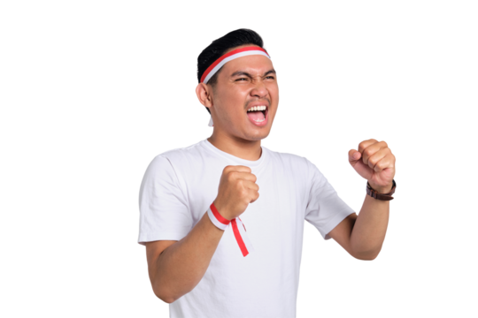 Excited young Asian men celebrate Indonesian independence day on 17 August, standing with raised hands isolated on transparent background