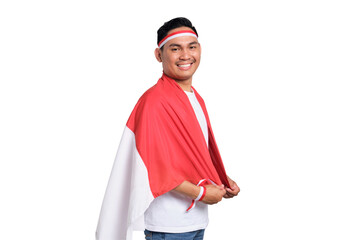 Young Asian men celebrate Indonesian independence day on 17 August with the Indonesian flag isolated on transparent background