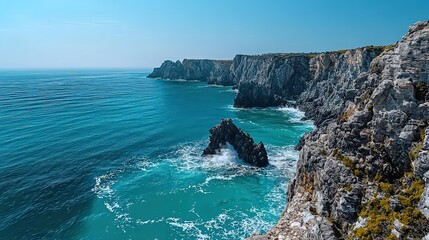 Obraz premium Coastal adventure rugged cliffs and serene waters seaside location nature photography bright day scenic view