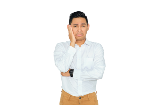 Portrait of bored young Asian man in casual clothes holding his cheek and feeling frustrated, having problems isolated on transparent background
