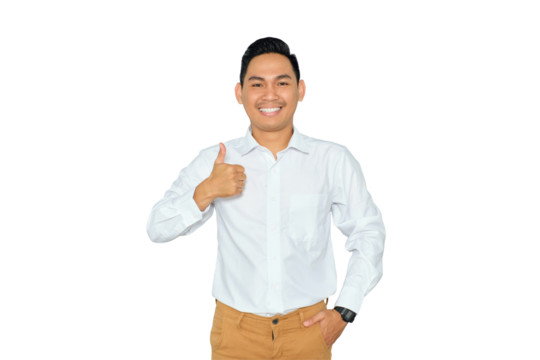 I like this. Happy successful young Asian man in formal wear showing thumbs up and looking at camera with smile isolated on transparent background