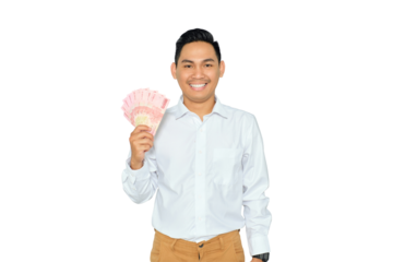 Finance concept. Smiling young Asian man in formal wear holding money and looking at camera with happy expression isolated on transparent background