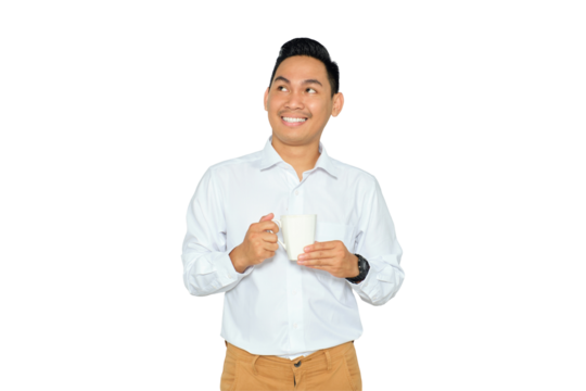 Portrait of happy young Asian man in formal wear holding cup of coffee and looking up with smile isolated on transparent background