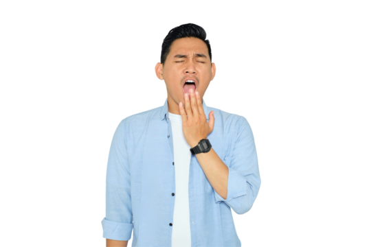 Portrait of tired young Asian man in casual clothes yawning and covering mouth with hand isolated on transparent background
