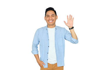 Hello. Portrait of friendly young Asian man in casual clothes showing hi gesture with waving hand and smiling isolated on transparent background