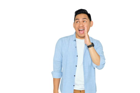 Handsome young Asian man in casual clothes holding hand near mouth, telling a secret, whispering gossip isolated on transparent background