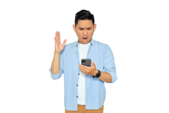 Portrait of handsome young Asian man in casual clothes looking at cellphone screen with shocked expression, reading bad news isolated on white background