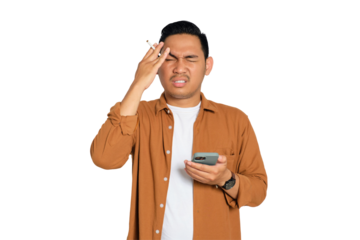 Tired young Asian man in casual shirt holding smartphone and cigarette having headache isolated on transparent background