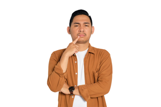 Confused young Asian man in casual shirt touching lips with finger and looking unsure to decide something isolated on transparent background