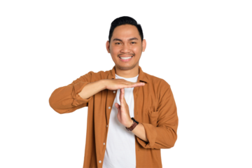 Happy smiling young Asian man in casual shirt showing time out gesture with hands isolated on transparent background